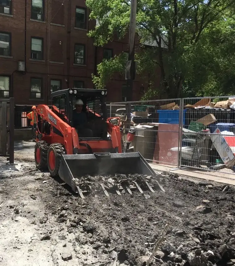 Skid steer on a demolition site